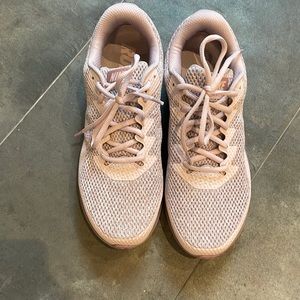 Women’s Nike running sneakers.